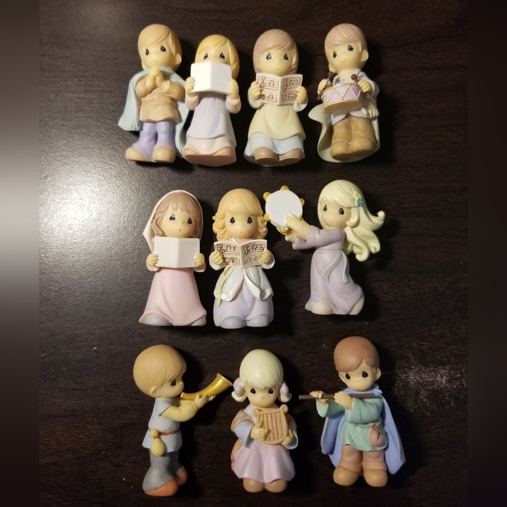 Precious Moments lot of 10 musical figurines.